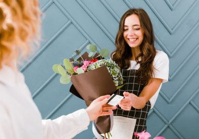 close-up-woman-buying-bouquet-flowers_23-2148377331